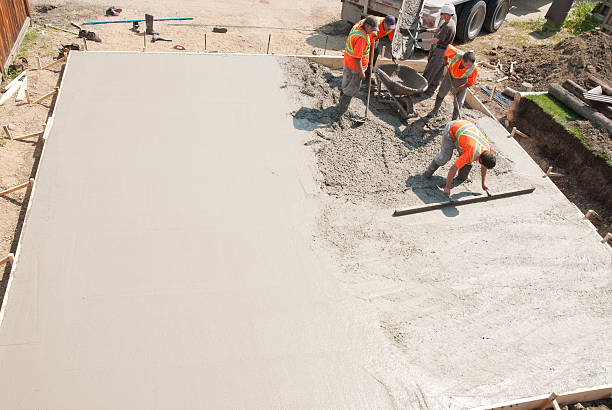Best Concrete Sidewalk Installation  in Village Of The Branch, NY